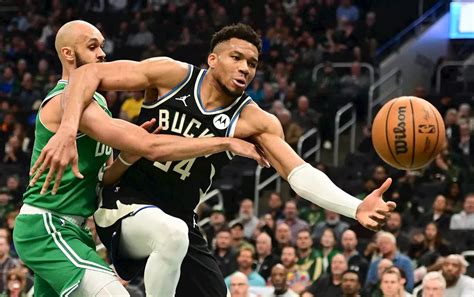 Giannis Antetokounmpo exits, but Bucks stun No. 1 Celtics.